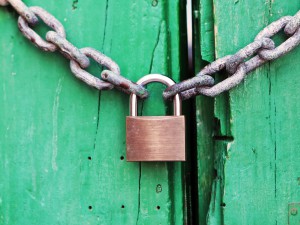 Door locked with chain and padlock